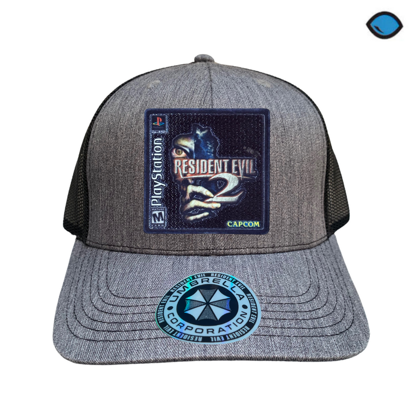 Gorra Resident Evil 2 “Game Cover” Gris-Negra Premium Trucker