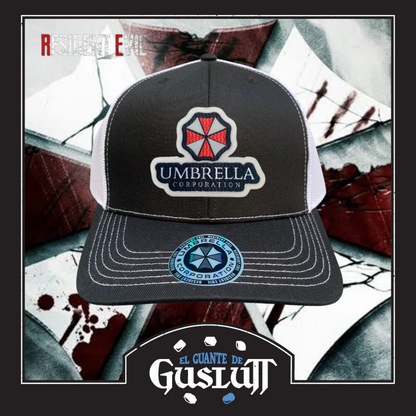 Gorra Resident Evil “Umbrella Corporation” Negra-Blanca Premium Trucker