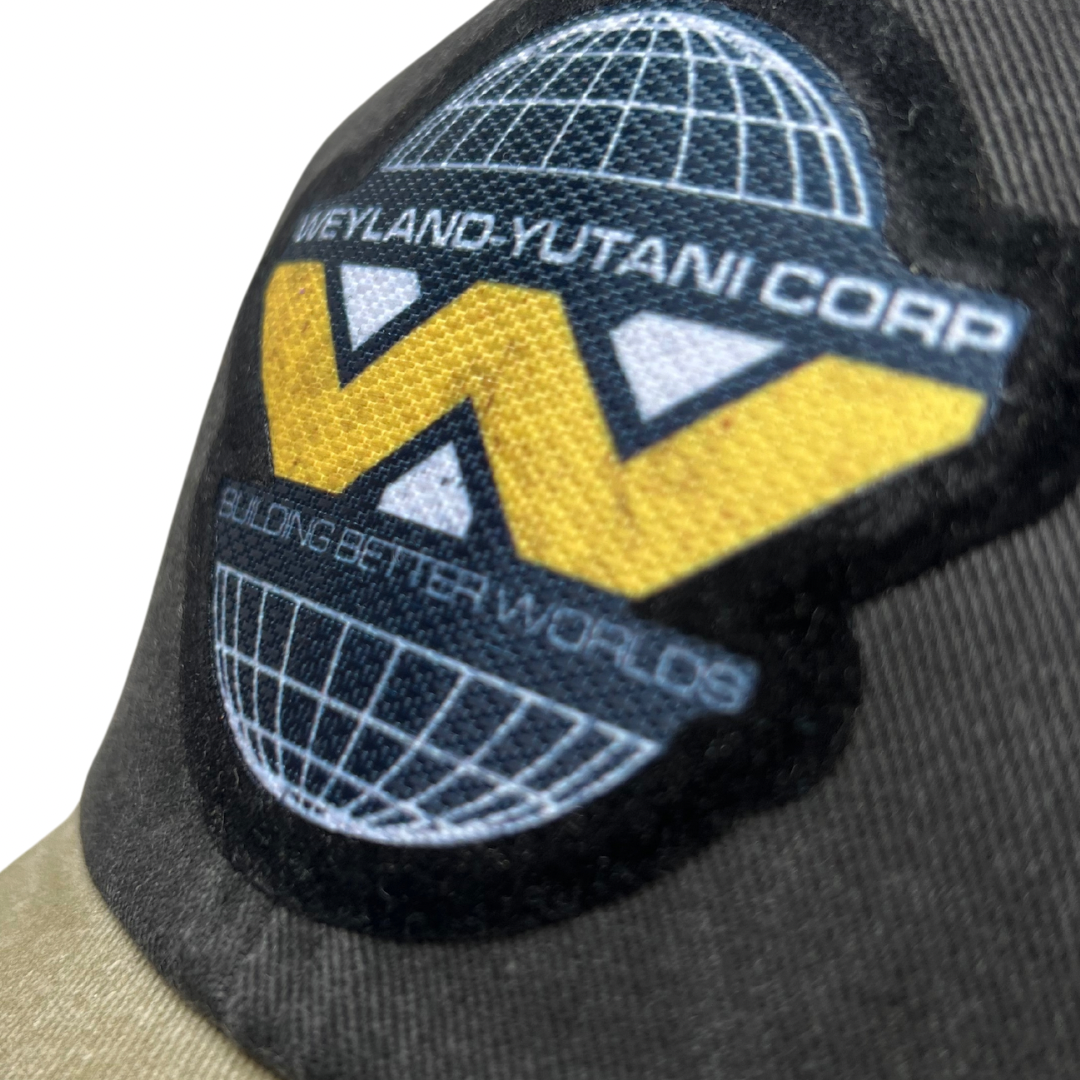 Gorra Aliens Weyland-Yutani Corp “Building Better Worlds” Logo Gris-Beige Vintage